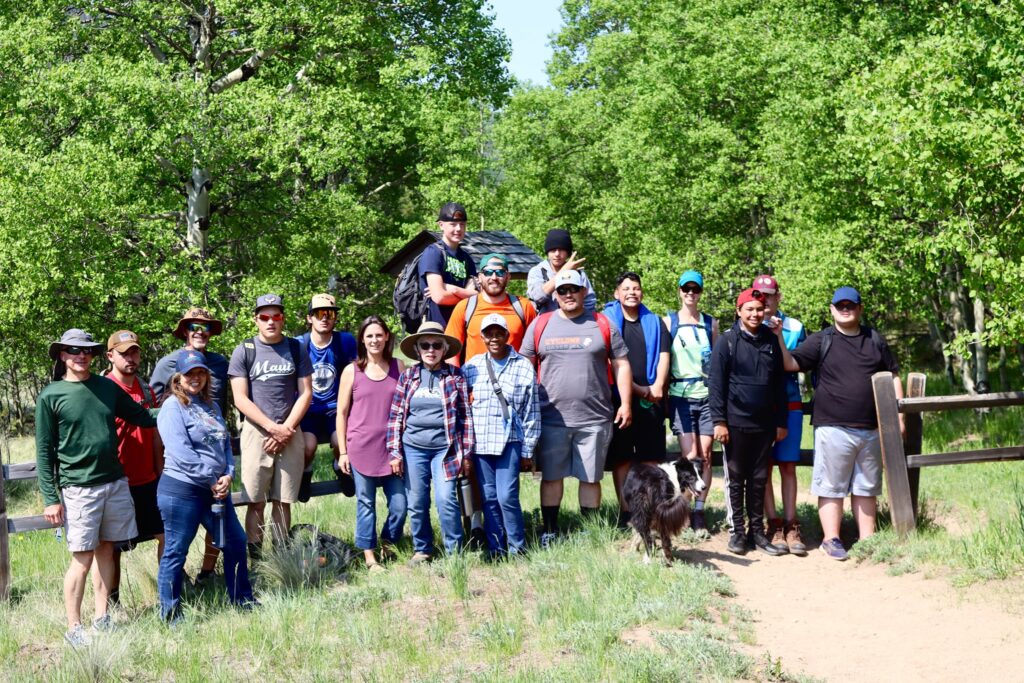 A group gathered outdoors at N-X Ranch in Gardner, Colorado